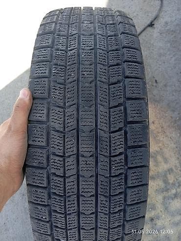 70: Шины 205 / 70 / R 15, Зима, Внедорожные (АТ/МТ), Dunlop — 1