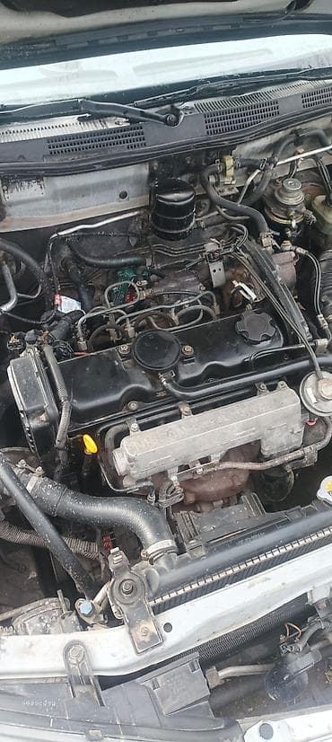 r15 100 4: Nissan Primera: 2002 г., 2 л, Седан — 2