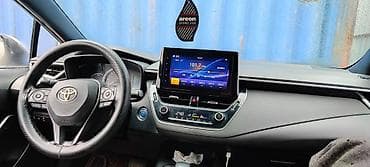 mazda demio 1998: Toyota Corolla: 2019 г., 1.8 л, Гибрид, Седан — 6