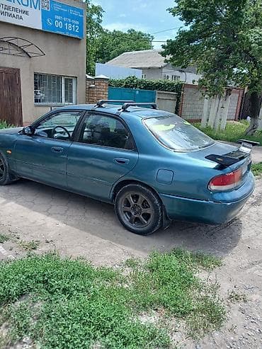 сетка авто: Mazda Cronos: 1993 г., 2 л, Автомат, Бензин, Седан — 9