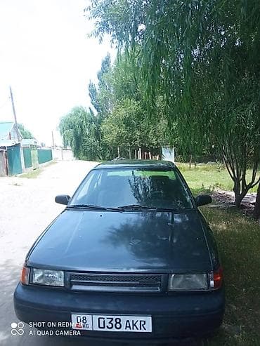 gac s9: Mazda 323: 1990 г., Механика, Бензин, Седан — 1