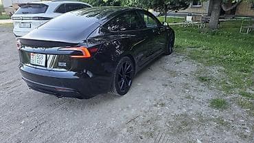 подзарядник для аккумулятора: Tesla Model 3: 2024 г., Автомат, Электромобиль, Седан — 4