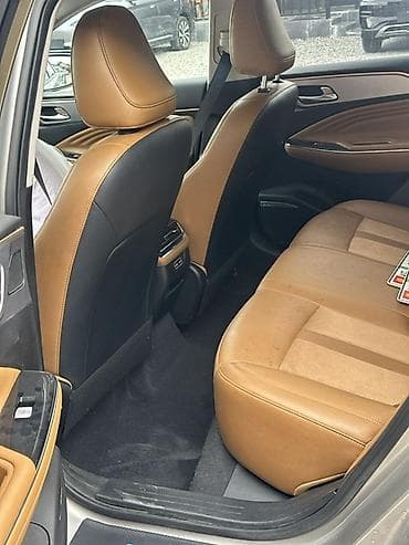 Продажа авто: GAC (Trumpchi) Aion S — электрический седан серебристого цвета. Кузов — 3
