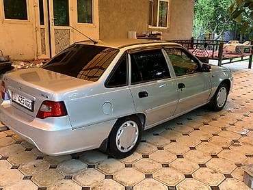7 мест 3 ряда сидений: Daewoo Gentra / Chevrolet Lacetti — салон и оснащение - Руль с — 9