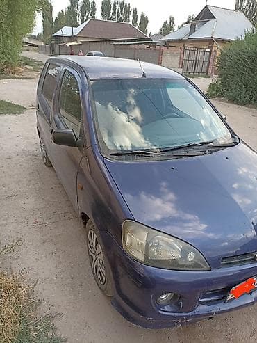 Daihatsu YRV: 2003 г., 1.3 л, Механика, Бензин — 4