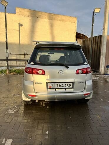 глушитель на гольф 2: Mazda Demio: 2005 г., 1.3 л, Автомат, Бензин, Хэтчбэк — 7