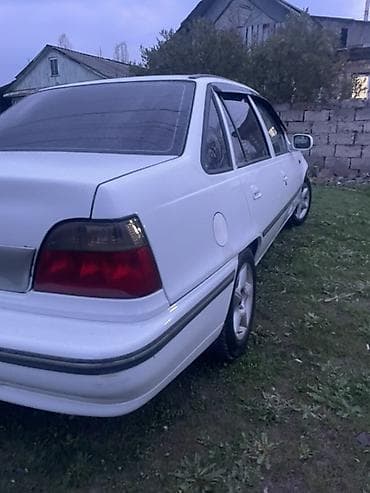 киа карнивал салон: Daewoo Nexia: 2003 г., Механика, Бензин, Седан — 7