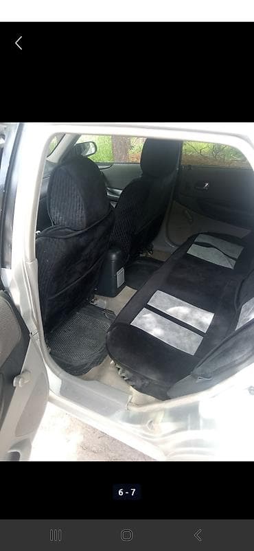 erec m8: Mazda 323: 2003 г., 1.6 л, Механика, Бензин, Универсал — 4