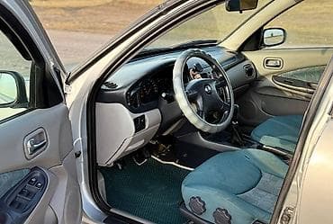 audi 99: Nissan Almera: 2002 г., 1.8 л, Механика, Бензин, Хэтчбэк — 10