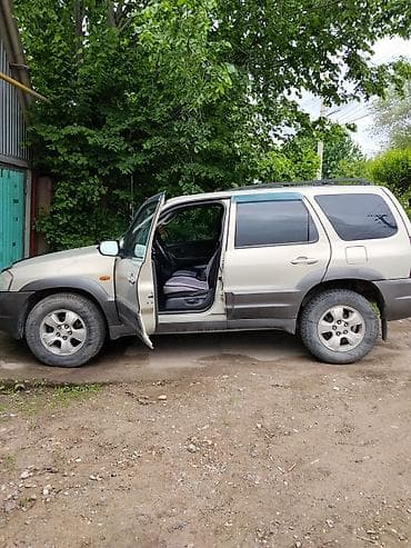 Mazda Tribute: 2003 г., 0.3 л, Автомат, Бензин, Внедорожник — 7