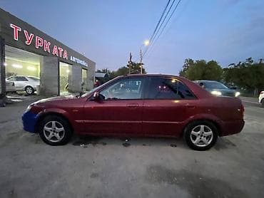 Mazda 323: 2002 г., 1.8 л, Автомат, Бензин, Седан