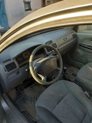 кун для мини трактора: Kia Rio: 2005 г., Механика, Бензиновая, Седан — 8