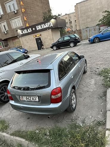 Продажа авто: Mazda Familia: 2002 г., 1.6 л, Механика, Бензин, Хэтчбэк — 3