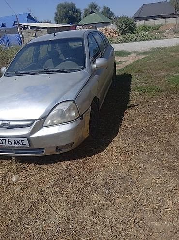 боковой грабиль: Kia Rio: 2005 г., 1.5 л, Механика, Бензин, Хэтчбэк — 3