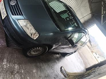 Volkswagen: Volkswagen Touran: 2002 г., 0.2 л, Механика, Минивэн — 1