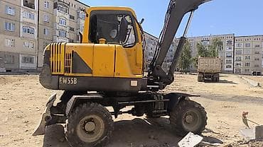 Экскаватор, Volvo, 2003 г., Колесный
