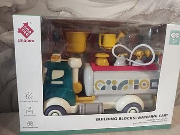Игрушка машинка поливалка