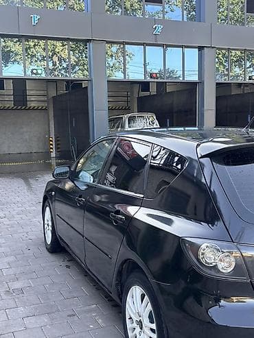 Mazda 3: 2006 г., Хэтчбэк — 3