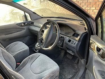 митсубиси спэйс стар: Mitsubishi Chariot: 1999 г., 2.4 л, Автомат, Бензин, Минивэн — 10
