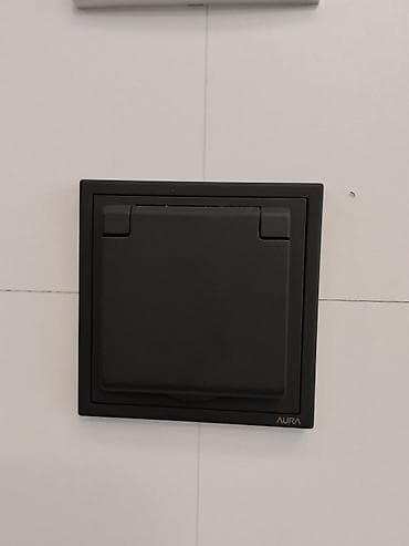 solutions upper: Выключатель/розетка с крышкой AURA, цвет графит (матовый) — 1