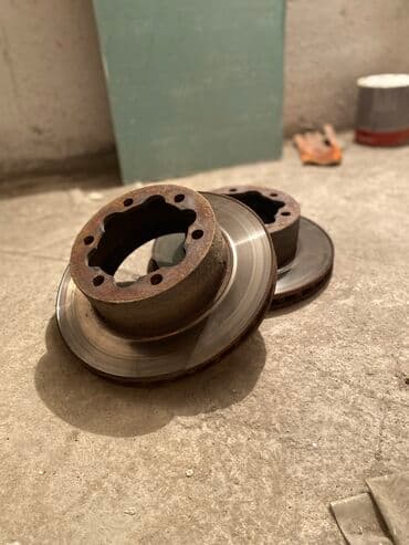 перфорированные тормозные диски: Задний тормозной диск Mercedes-Benz Б/у, Оригинал, Германия — 1