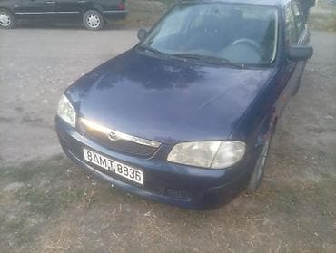e klass: Mazda 323: 2000 г., Механика, Бензин — 4