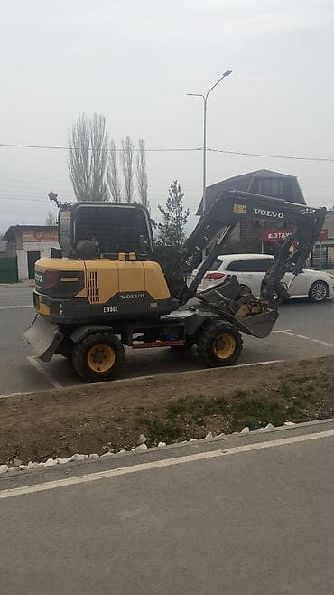 миксер бетономешалка: Экскаватор, Volvo, 2018 г., Колесный — 6