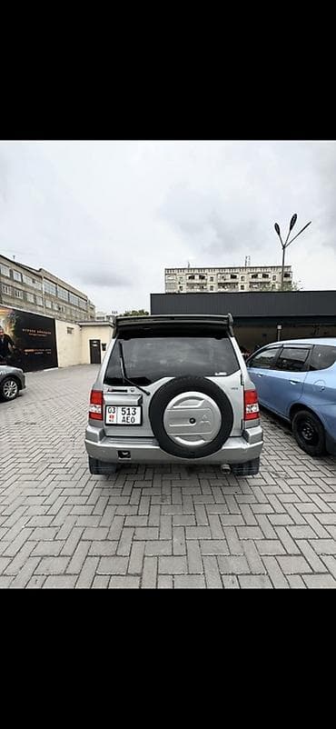 Транспорт: Mitsubishi Pajero iO: 1999 г., 1.8 л, Автомат, Бензин, Кроссовер — 6