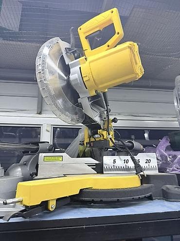 Электроинструменты: Торцовочная пила (усовочная) с протяжкой - Электрическая стационарная — 1