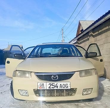 Mazda 323: 1995 г., 1.6 л, Автомат, Бензин, Седан