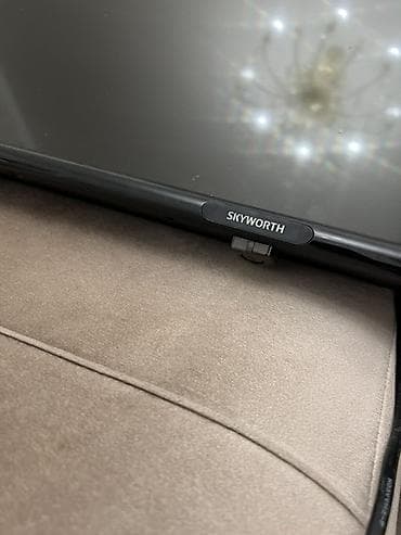 sky vision: Телевизор SKYWORTH, диагональ около 40–43" (высота экрана ~58–60 см) — 3