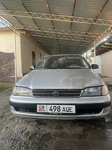 тико 2: Toyota Carina E: 1997 г., 1.8 л, Кол менен иштөөчү, Бензин, Седан — 1
