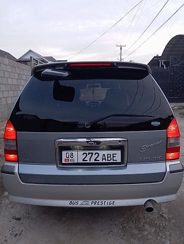 водная техника: Mitsubishi Chariot: 1998 г., 2.4 л, Автомат, Бензин, Универсал — 10