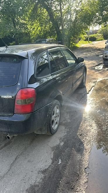 mini copper: Mazda 323: 2001 г., Универсал — 4