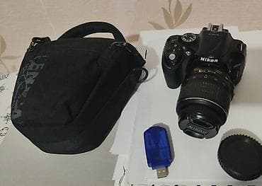 nikon d5000 цена: Зеркальная камера Nikon D5200 с комплектным зум-объективом AF‑S DX — 1