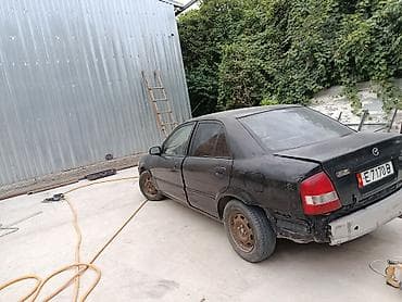 mini kooper: Mazda Protege: 2002 г., Седан — 5