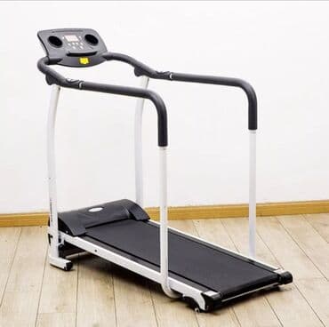 беговая дорожка купить для дома: Компактная беговая дорожка в бело-черной расцветке. Оснащена поручнями — 1