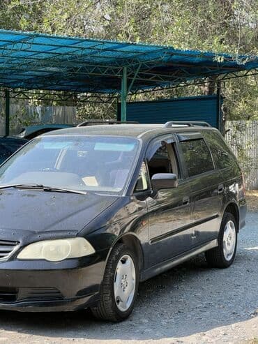 форестер 2015: Honda Odyssey: 2001 г., 2.3 л, Типтроник, Газ, Минивэн — 7