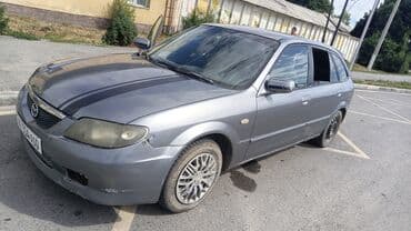 скутера макси: Mazda 323: 2003 г., 2 л, Механика, Дизель, Хэтчбэк — 5