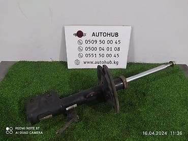 Амортизатор передний левый для Toyota Opa (кузов ZCT10), год 2005
