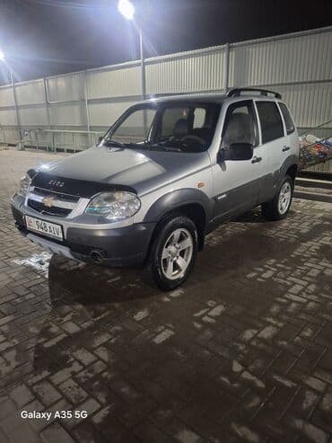 шины на нивы: Chevrolet Нива: 2003 г., 1.7 л, Механика, Бензиновая, Внедорожник — 1