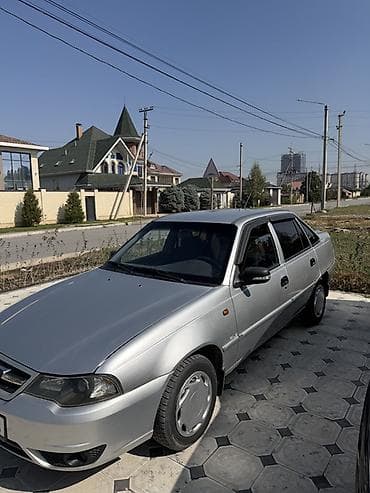step 2: Daewoo Nexia: 2010 г., Бензин, Седан — 2
