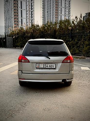 windom 20: Nissan Wingroad: 2004 г., 2 л, Автомат, Универсал — 6