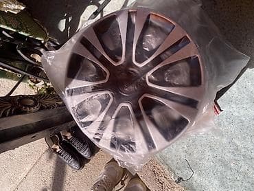 diska 14: Колпаки R 15, Новый, Комплект — 9