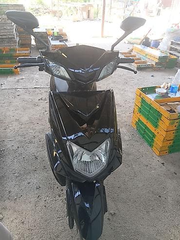 Скутер/мопед, городской класс, цвет черный. Основные особенности: -