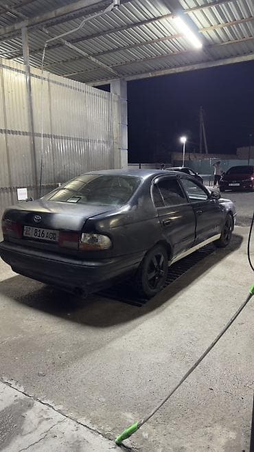 e star: Toyota Carina E: 1997 г., Механика, Седан — 4
