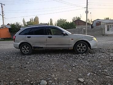 tyre master: Mazda 323: 2003 г., 1.3 л, Ручные, Бензин, Универсал — 3