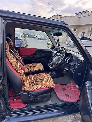 subaru sambar: Mitsubishi Pajero Junior: 1998 г., 1.1 л, Автомат, Бензин, Внедорожник — 4