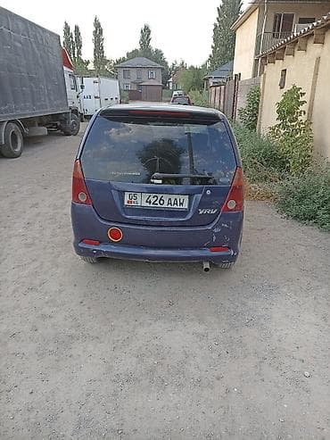 Daihatsu YRV: 2003 г., 1.3 л, Механика, Бензин — 3