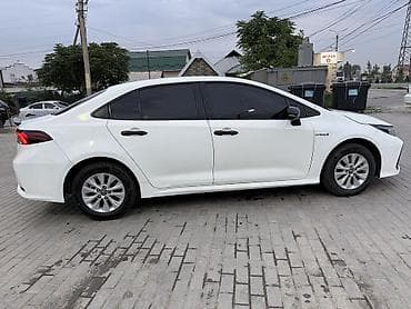 crown 2018: Toyota Corolla: 2022 г., 1.8 л, Вариатор, Гибрид, Седан — 3